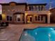 Exterior of the home with a balcony, pool, and outdoor seating area perfect for relaxation at 921 E Canyon Way, Chandler, AZ 85249