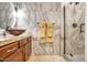 Luxurious bathroom featuring designer tile, a vessel sink, and a glass-enclosed shower at 921 E Canyon Way, Chandler, AZ 85249