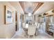 Elegant dining room with ornate chandelier, custom ceiling design, and built-in display cabinets at 921 E Canyon Way, Chandler, AZ 85249