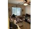 Cozy bedroom with a crib, day bed and decor at 9726 E Butte St, Mesa, AZ 85207