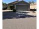 Charming single-story home with a two-car garage and well-maintained landscaping at 9726 E Butte St, Mesa, AZ 85207