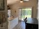 Eat-in kitchen with granite island, stainless appliances and access to a backyard at 9726 E Butte St, Mesa, AZ 85207