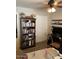 Bright and airy office space with a bookcase, rolling office chair, and desk at 9726 E Butte St, Mesa, AZ 85207