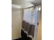 Shower stall with dark/light shower curtain and view of shower head at 9726 E Butte St, Mesa, AZ 85207