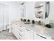 Modern bathroom with double sinks, sleek fixtures, and plenty of counter space at 1 E Lexington Ave # 1209, Phoenix, AZ 85012