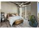 Cozy bedroom featuring a large window with city views, offering a peaceful retreat at 1 E Lexington Ave # 1209, Phoenix, AZ 85012