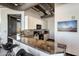 Modern kitchen with granite countertops, a breakfast bar, and stainless steel appliances at 1 E Lexington Ave # 1209, Phoenix, AZ 85012