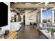 Spacious living area featuring modern design, open layout, and city views through large windows at 1 E Lexington Ave # 1209, Phoenix, AZ 85012