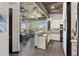 Open-concept living space with a modern kitchen and living area, showcasing city views at 1 E Lexington Ave # 1209, Phoenix, AZ 85012