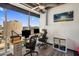Bright office space features expansive city views, modern decor, and a functional layout with dual workstations at 1 E Lexington Ave # 1209, Phoenix, AZ 85012