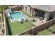 Backyard oasis featuring a pool, putting green, patio, and lounge chairs for ultimate relaxation and entertainment at 10029 E Wavelength Ave, Mesa, AZ 85212