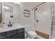 Cozy bathroom featuring a shower-tub combo and modern sink at 10029 E Wavelength Ave, Mesa, AZ 85212