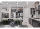 Modern kitchen features stainless steel appliances, granite countertops, and an island with seating at 10029 E Wavelength Ave, Mesa, AZ 85212