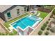 Stunning backyard pool with lounge seating, artificial turf, and a pristine, refreshing atmosphere at 10029 E Wavelength Ave, Mesa, AZ 85212