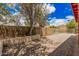 Spacious backyard featuring brick flooring and brick planters at 10244 N 65Th Ln, Glendale, AZ 85302