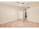 Empty bedroom featuring tile flooring and a ceiling fan at 10244 N 65Th Ln, Glendale, AZ 85302