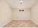 Empty bedroom with tile flooring, a ceiling fan, and a window at 10244 N 65Th Ln, Glendale, AZ 85302