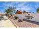 Chaparral Ranch II community sign with desert landscaping, set against a backdrop of well-maintained homes at 10244 N 65Th Ln, Glendale, AZ 85302