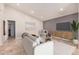 Staged living room with contemporary furnishings, neutral decor, and modern accents at 10244 N 65Th Ln, Glendale, AZ 85302