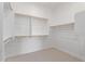 Large walk-in closet with built-in shelving and ample storage space at 10332 E Utah Ave, Mesa, AZ 85212