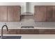 Close up on a well-equipped kitchen with stainless steel appliances and ample cabinet space at 10332 E Utah Ave, Mesa, AZ 85212