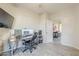 Functional home office featuring tile floors, neutral walls, and an adjacent room at 11156 E Lost Canyon Ct, Gold Canyon, AZ 85118