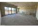 Spacious open floor plan living room with large windows at 11416 E Utah Ave, Mesa, AZ 85212