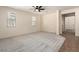 Bright bedroom showcasing large windows and a neutral color palette for versatile decor at 11834 N 147Th Ln, Surprise, AZ 85379