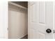 Small carpeted closet with clothing bar for hanging clothes and accessories providing organized storage at 11834 N 147Th Ln, Surprise, AZ 85379