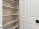 Bright pantry features ample shelving for organized storage solutions, ready for all your supplies at 11834 N 147Th Ln, Surprise, AZ 85379