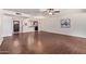 Large living room with hardwood floors, neutral paint, and great natural light at 129 Leisure World --, Mesa, AZ 85206