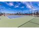 Scenic tennis courts surrounded by lush landscaping, perfect for recreational play and community events at 129 Leisure World --, Mesa, AZ 85206