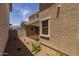 Well-maintained backyard with a covered patio, perfect for outdoor gatherings and relaxation at 13473 N 158Th Ave, Surprise, AZ 85379