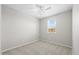 Simple bedroom features plush carpet, a bright window, and neutral walls at 13473 N 158Th Ave, Surprise, AZ 85379