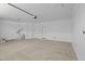 Clean and organized garage space, offering secure parking and potential for storage or workshop at 13473 N 158Th Ave, Surprise, AZ 85379