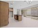 Open-concept kitchen with granite countertops, stainless steel appliances, and sliding glass doors to the backyard at 13473 N 158Th Ave, Surprise, AZ 85379