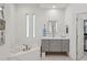 Luxurious bathroom with a soaking tub, dual vanity, and elegant fixtures at 15045 E Sundown Dr, Fountain Hills, AZ 85268