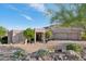 A beautiful desert home with mature landscaping and a brick driveway at 15045 E Sundown Dr, Fountain Hills, AZ 85268