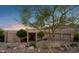 Charming home with desert landscaping, a brick driveway, and a mountain backdrop at 15045 E Sundown Dr, Fountain Hills, AZ 85268