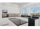 Modern kitchen with white cabinets, black countertops, and stainless steel appliances at 15045 E Sundown Dr, Fountain Hills, AZ 85268
