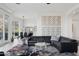 Bright living room featuring a sectional sofa, stylish decor, and a view, perfect for relaxing or entertaining guests at 15045 E Sundown Dr, Fountain Hills, AZ 85268