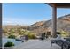 Covered patio with seating area and scenic mountain views at 15045 E Sundown Dr, Fountain Hills, AZ 85268