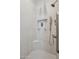 Modern tiled shower featuring a rain shower head and a built-in shelving niche at 15045 E Sundown Dr, Fountain Hills, AZ 85268