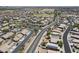 Community aerial view featuring well-maintained streets, desert landscaping, and solar panels on roofs at 1518 E 12Th St, Casa Grande, AZ 85122