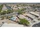 Lovely house with an in-ground pool, palm trees, and well-manicured landscaping in a quiet suburban setting at 1518 E 12Th St, Casa Grande, AZ 85122