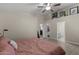 Spacious bedroom with an en suite bathroom and walk in closet with ample space for storage and organization at 1518 E 12Th St, Casa Grande, AZ 85122