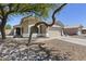 Charming single-story home with a well-maintained lawn and a traditional design, offering comfort and curb appeal at 1518 E 12Th St, Casa Grande, AZ 85122