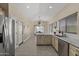 Kitchen view with stainless steel appliances, island, and adjacent dining area at 1518 E 12Th St, Casa Grande, AZ 85122