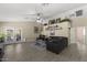 Spacious living room with neutral paint, tile flooring, a ceiling fan, and ample natural light at 1518 E 12Th St, Casa Grande, AZ 85122