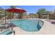 Sparkling private pool features a baja shelf, desert landscaping, and plenty of room to lounge poolside at 1518 E 12Th St, Casa Grande, AZ 85122